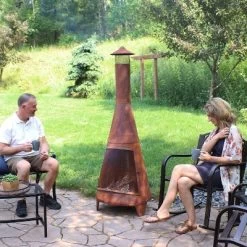 Sunnydaze Decor Sunnydaze Outdoor Backyard Large Freestanding Oxidized Steel Wood-Burning Fire Pit Chiminea - 70" - Rust Finish -Quality Garden Outdoor Store GUEST cc22fb48 0a91 4737 9296 cebd16dc6fe7